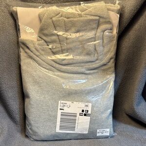 Woman Within Gray Turtleneck Sweatshirt